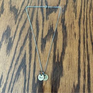 Runner necklace with bronze pendants engraved with 13.1 and 26.2, silver chain